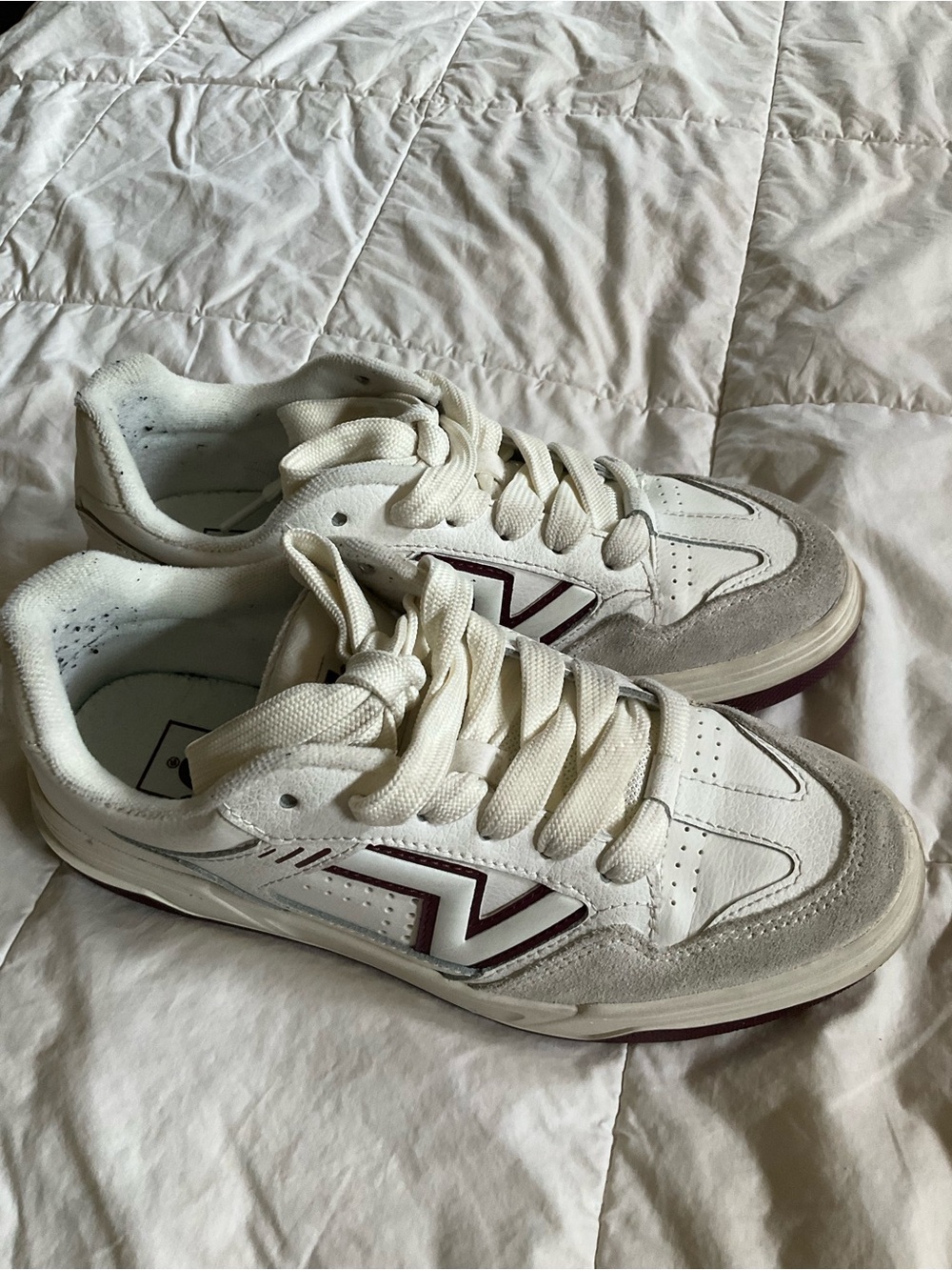 Vans White Sneakers with Light Blue Accent
